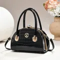 Elegant black crocodile texture evening bag with diamond clasp and gold hardware accents - Stone Pattern Style / Stone Pattern Black