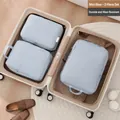 Fog blue 3-piece travel packing cube set including large and medium laundry bags - Three-Piece Set / Foggy Blue
