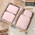 Set of 4 pink travel organizer bags for suitcase packing and efficient luggage storage - Four-Piece Set / Dusty Pink