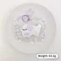Süßes weiß-violettes Welpen-Squishy-Stressabbau-Spielzeug mit Sternclip und Schlüsselring 63,2 g - Hund / Lila
