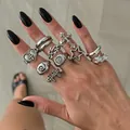 Punk style silver ring set with cross and star motifs for trendy multi-finger stacking - 10-Piece Cross and Star Ring Set (07544) / Antique Silver