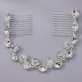 Elegant silver bridal hair comb featuring sparkly oval and leaf rhinestone vine design - Holiday Match Style (HS-J7092S)