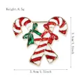 Broche de bastón de caramelo de Navidad con esmalte rojo blanco y un lazo verde - Bastones de Caramelo Dobles de Navidad (XZ5013)