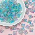 Detailed macro view of 10mm blue and purple gradient glass flower beads for DIY crafts - Pink Blue (L944)