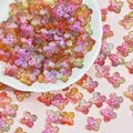 Close-up of 10mm colorful 4-petal glass flower beads for DIY jewelry making projects. - Multicolor (L947)