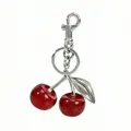 Porte-clés cerise en résine pailletée rouge avec feuille argentée et fermoir mousqueton - Silver rod - red cherry 32mm