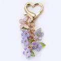 Elegant purple flower keychain with heart clasp and butterfly charm for bag decoration - Flower String / Plated Purple
