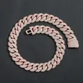 Detailed macro view of an iced out 22mm rose gold Cuban link chain necklace for men. - Rose Gold (22mm Width)
