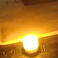 Mini warm glow USB plug-in night light for cozy bedroom atmosphere - Yellow