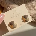 Elegant round double-stud earrings with brown and beige enamel in a gold metallic finish - Coffee and Brown Ball Style