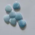 Hand-polished natural light blue crystal heart-shaped stones for DIY craft decoration - Synthetic Aquamarine