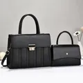 Set of two black litchi textured leather handbags in different sizes - 30x11x23cm / Black