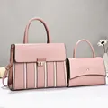 Two-piece pink handbag set with elegant flap design and polished gold hardware detail - 30x11x23cm / Pink