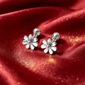 Elegant minimalist 3D flower stud earrings in polished silver titanium steel finish - Silver Daisy Screw Ball (Single)