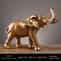 Elegant golden elephant resin figurine for home and office decor in metallic finish - Fortune Elephant Statue (7128K-02) / Gold