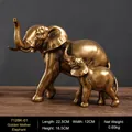 Elegant golden elephant mother and child resin statue for home or office shelf decor. - Mother and Child Elephant Statue (7128K-01) / Gold