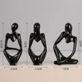 Moderne schwarze abstrakte Denker-Figur aus Harz, 3er-Set für minimalistische Deko - 7128p-03 black character three-piece set packaging