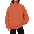 Detailed view of an oversized orange mock neck sweatshirt featuring ribbed cuffs - Coral