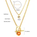 Detailansicht der vergoldeten Edelstahl-Doppelkette mit Stern-T-Verschluss-Detail. - Goldene doppelschichtige Sternenkette - Orange (NE29120LG)