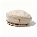Macro view of the golden B-logo and chain detail on a stylish beige wool beret hat - M (56-58cm) / Khaki (Spring/Autumn Thin)