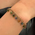 Vintage gold chain bracelet with colorful beads shown on a female model wrist - Gold Multi-color Bead Style (N-1034)