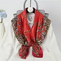 Elegant red satin square scarf featuring leopard and gold chain prints on white shirt - 90*90cm / Crimson Chain
