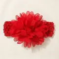 Close-up of a vibrant red chiffon flower headband with an elastic crochet band for babies. - Red