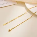 Hochwertiges Armband aus 18 Karat vergoldetem Titanstahl mit Verlängerungskette - Panzerkette mit Perlen Stil / Gold