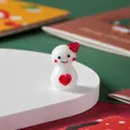 Cute handmade glass snowman figurine with red heart, miniature Christmas desktop ornament - Smiling Heart Snowman