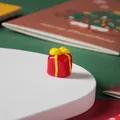 Miniature handmade red glass gift box figurine for festive Christmas decor, 1.5cm tall - Red Gift Box