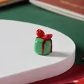 Small handmade green glass Christmas gift box ornament featuring a delicate red bow - Green Gift Box