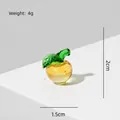 Handgemaakt miniatuur glazen appel ornament met groene blaadjes voor kerstdecoratie - Gele Vredesappel 2cm