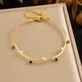 Elegant gold-plated stainless steel bracelet featuring black and white crystal stone accents - Black and White Rhinestone Wave Chain (B2046) / Gold