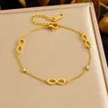 Elegant gold plated stainless steel bracelet with infinity symbols and clear crystals - Infinity Symbol Rhinestone Style (B2056) / Gold