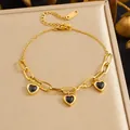 Elegant gold-plated stainless steel bracelet featuring three black heart charms - Black Heart Pendant Combination Chain (B2058) / Gold