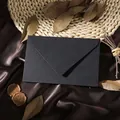 Macro detail of a vintage black cross-hatched textured envelope in a premium setting - 1pc Linen Black Envelope / Black