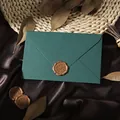 Detail view of dark green linen envelope with vintage gold wax seal and dried leaves - 1pc Linen Green Envelope + 1 Wax Seal / Green