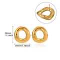 Macro detail of gold-plated titanium steel stud earrings showing precise size dimensions - Irregular Conch Spiral Style (G126333) / Gold