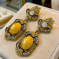 Detail of vintage palace style drop earrings with yellow stones and sparkling rhinestones - Flower Shape (10#) / Red