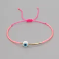 Delicate pink beaded bracelet with evil eye charm and adjustable cord for daily wear. - Pink Rope Evil Eye Style (MI-B200498S) / Pink (Evil Eye)