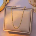 Elegant gold bead chain necklace in stainless steel displayed on a jewelry box - Satellite Chain / Single Pack (40+5cm) / Gold
