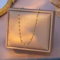 Elegant golden titanium steel lip chain necklace displayed on a minimalist jewelry box - Lips Chain / Single Pack (40+5cm) / Gold