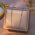 Minimalist silver stainless steel snake chain necklace presented on a jewelry box - Round Snake Chain (09) / Single Pack (40+5cm) / Steel