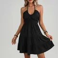 Vista detallada del elegante vestido negro de estilo francés con cuello halter - 3XL / Tops / Negro