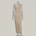 Elegant beige peplum top and long skirt two-piece set shown on transparent mannequin - S / Top And Bottom / Off White