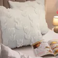 Close-up of white plush embroidered throw pillow cases with textured tulip floral patterns. - 45x45cm / White Tulip
