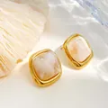 Elegant gold square stud earrings with marble resin inlay and summer beach shell background - Sugar Cube Style (ky160) / Milky White
