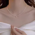 Élégant collier de perles blanches avec un petit pendentif en forme de cœur en argent - Style 13