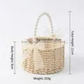 Cesta tejida a mano en color crema con asa de perlas y lazo - Cesta tejida con asa de perlas (Pequeña, 15 cm)