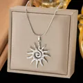 Elegant silver sun pendant necklace in hammered titanium steel on beige display box - Sun Necklace (H1262)